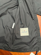 Moncler long black jacket inner back with small Moncler label