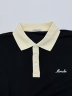 Moncler polo shirt close-up: cream collar and front button placket