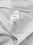 Inside collar seam with size and care tag on white T-shirt