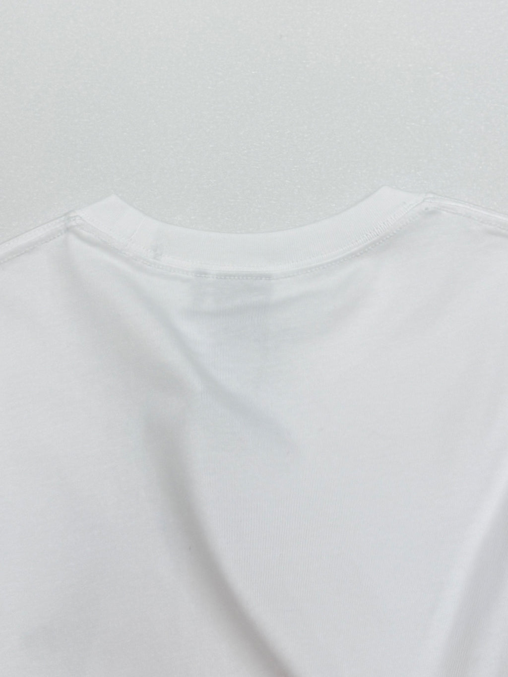 White crewneck T-shirt top portion with collar seam