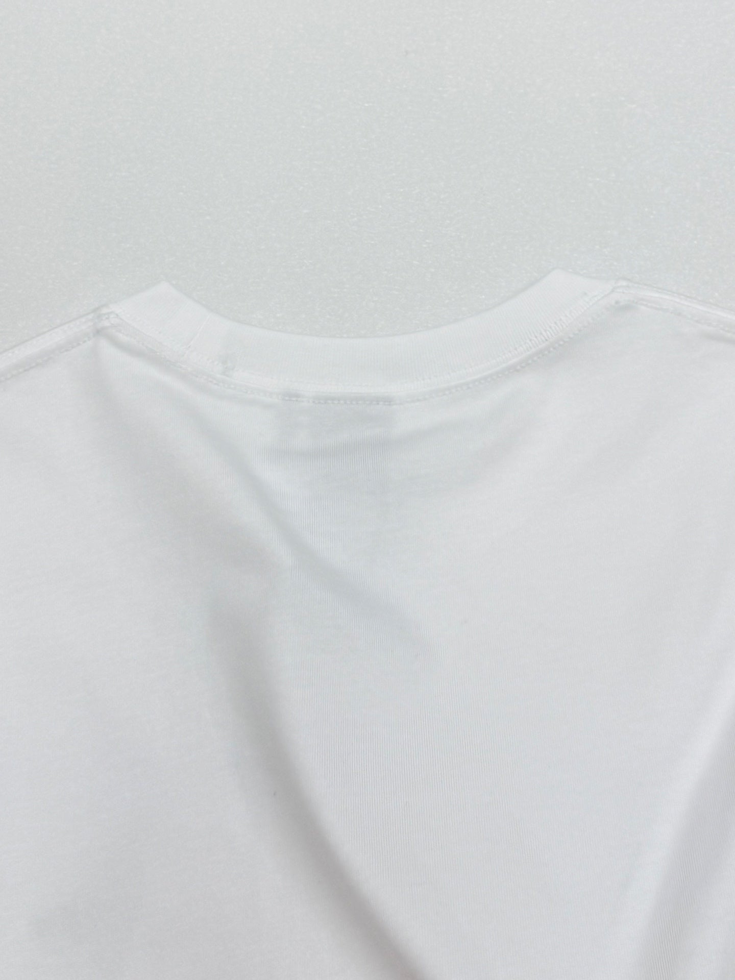 White crewneck T-shirt top portion with collar seam