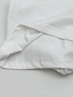 White T-shirt fabric drape with stitched hem and sleeve seam