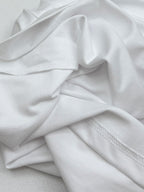 White T-shirt fabric with stitched side seam detail