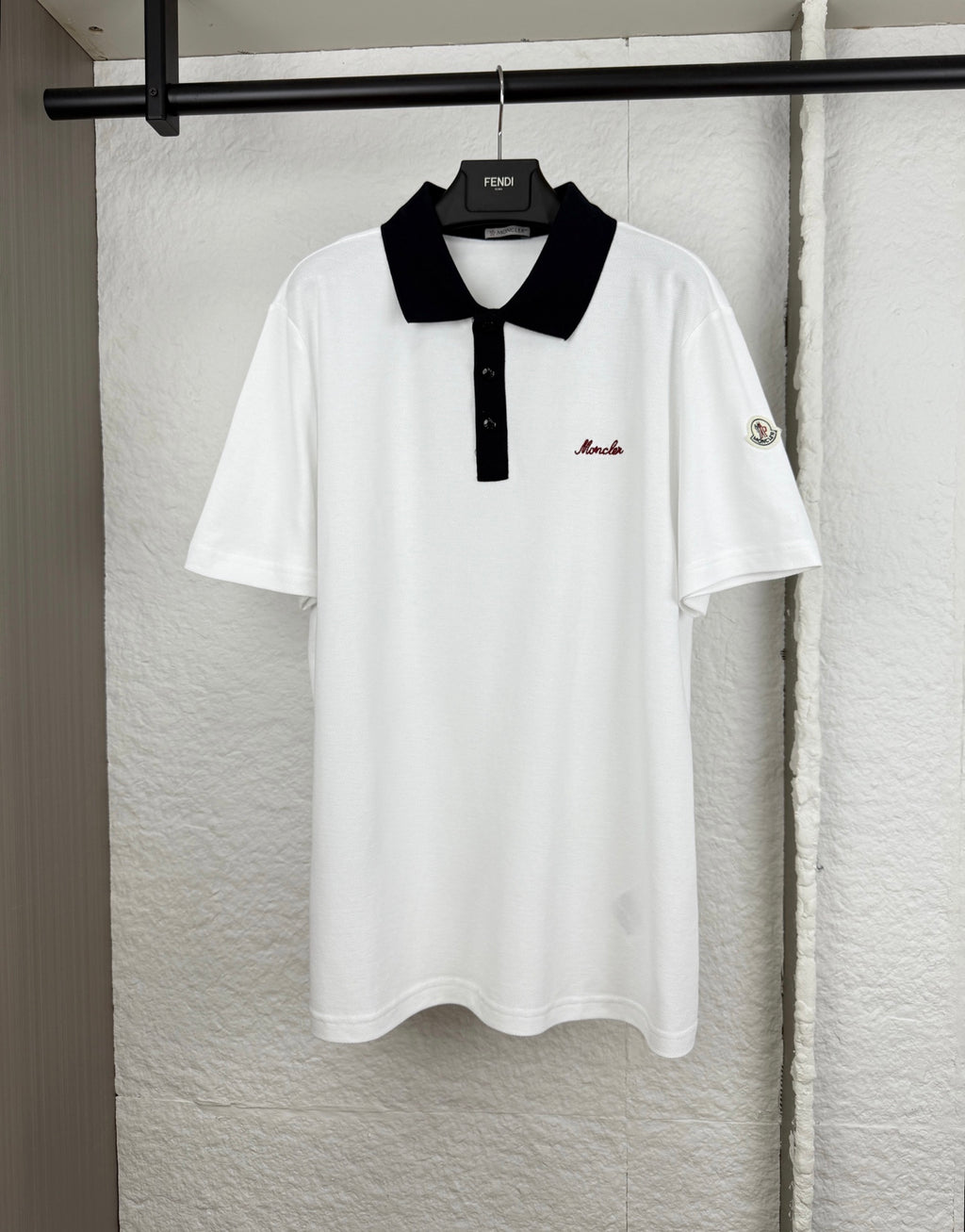 Moncler short-sleeve polo shirt with black collar and button placket, white