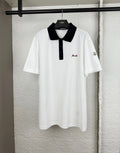 Moncler short-sleeve polo shirt with black collar and button placket, white