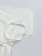 White Louis Vuitton T-shirt sleeve and hem close-up