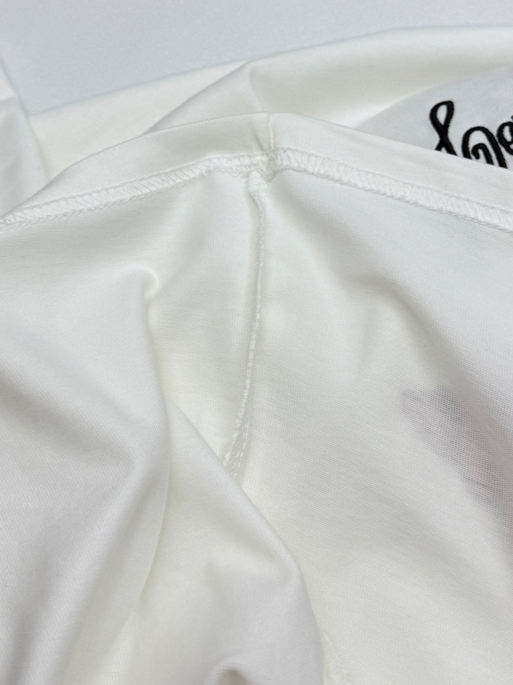 White Louis Vuitton T-shirt back yoke seam detail with stitching