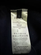Inside navy hoodie size label marked L with FENDI branding