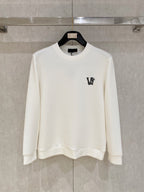 White crewneck sweatshirt with small V logo on left chest
