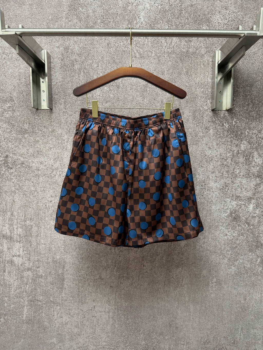 Louis Vuitton check shorts with blue dot print and elastic waistband