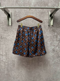 Louis Vuitton check shorts with blue dot print and elastic waistband