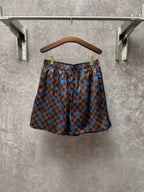 Louis Vuitton check shorts with blue dot print and elastic waistband