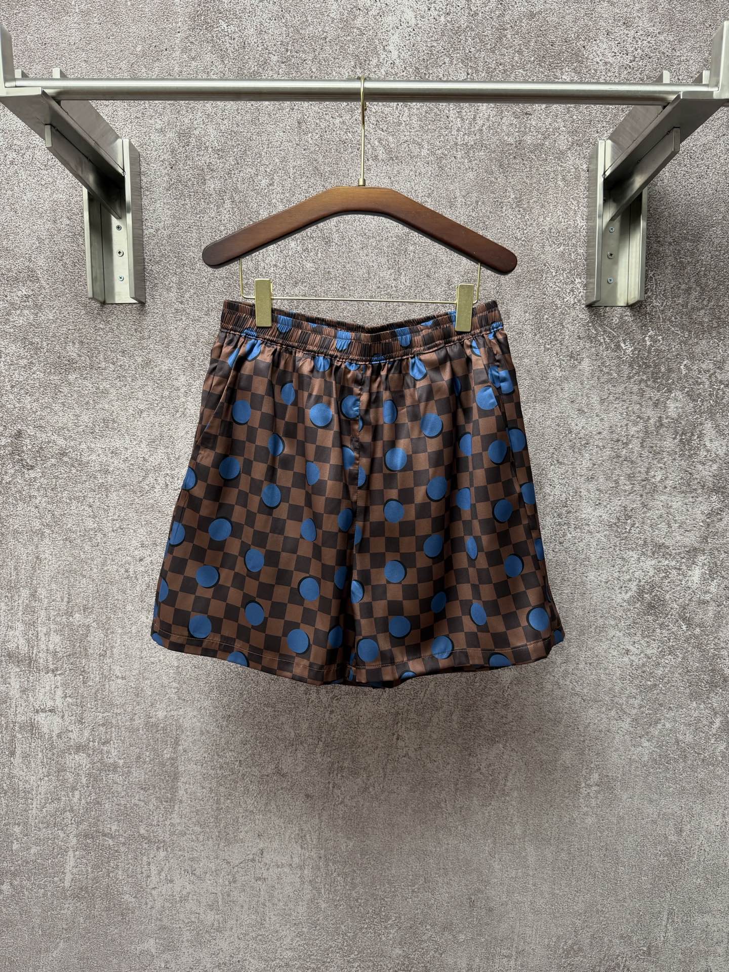 Louis Vuitton check shorts with blue dot print and elastic waistband