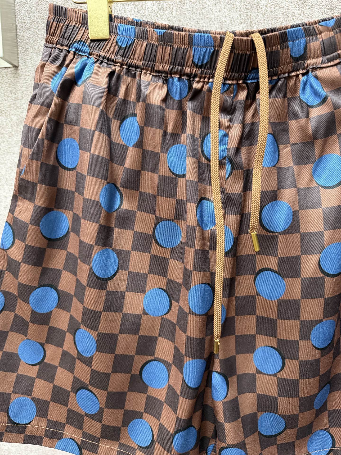 Louis Vuitton blue dot check shorts with drawstring tie and elastic waistband