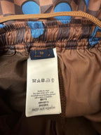 Louis Vuitton shorts fabric care label and size tag at waistband