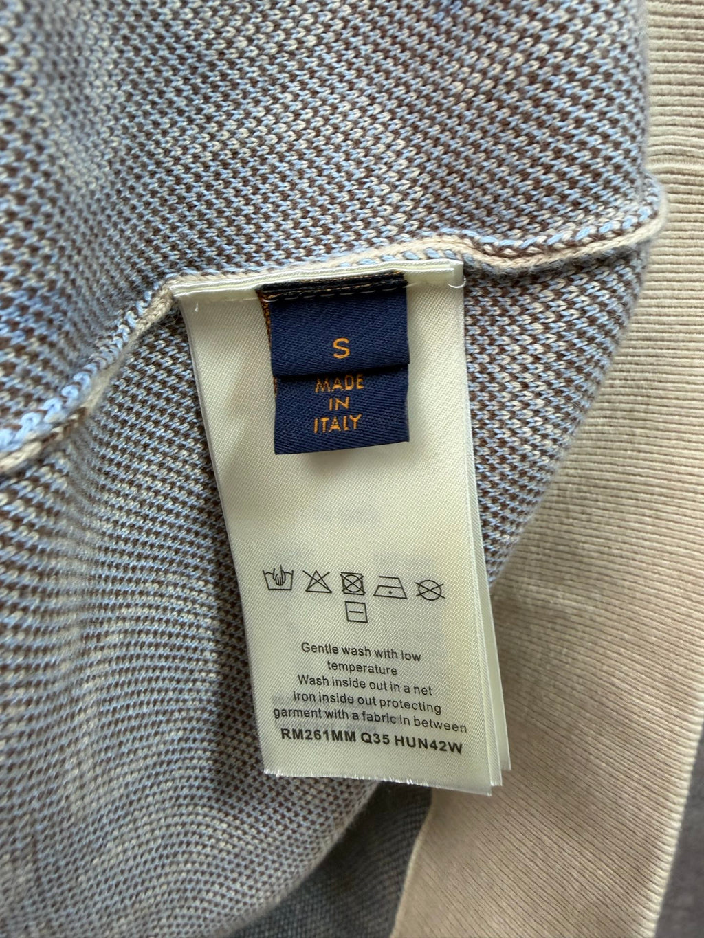 Hoodie care label, Made in Italy tag with washing icons and instructions