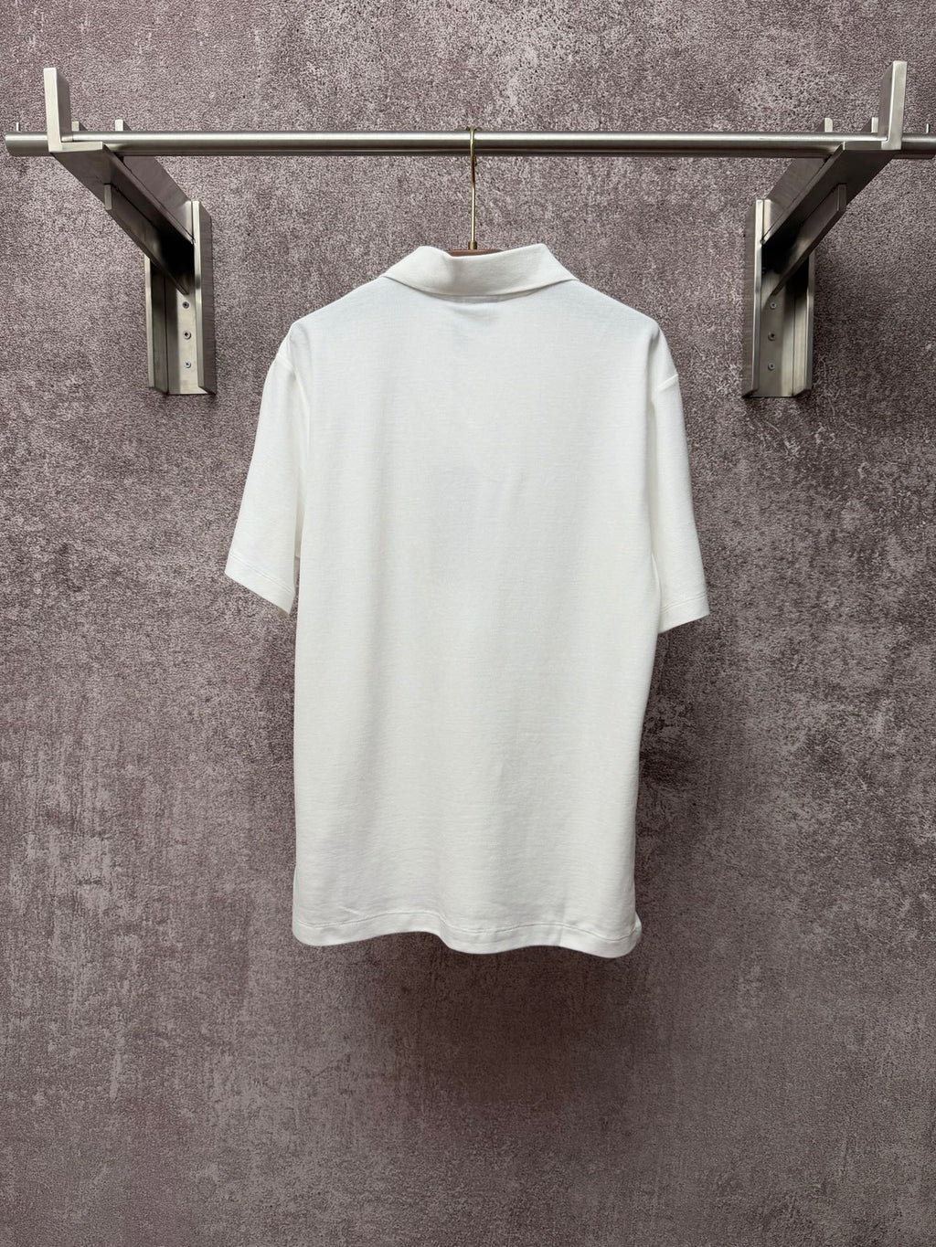 White Dior polo shirt back view with collar and short sleeves