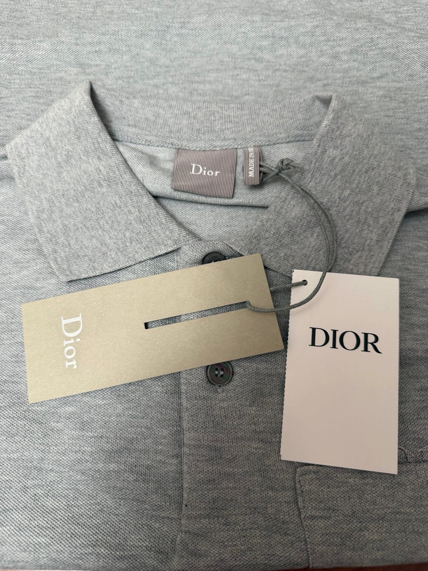 Dior short-sleeve polo shirt with tags, light gray knit button placket