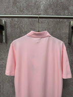 Dior polo shirt in light pink, back view with ribbed collar and short sleeves
