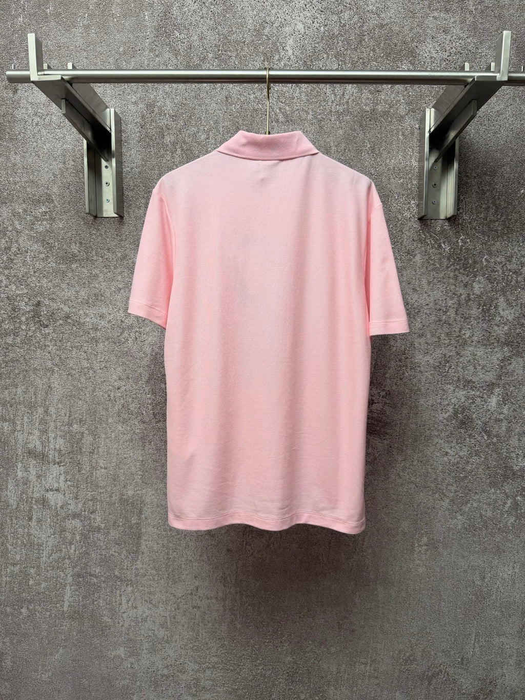 Dior short-sleeve polo shirt in light pink, back view with ribbed collar