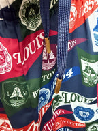 Drawstring shorts with multicolor Louis Vuitton-style logo print and tassel