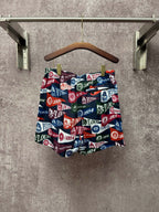 Patterned shorts with elastic waistband and drawstring, multicolor logo print