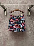 Patterned shorts with elastic waistband and drawstring, multicolor logo print