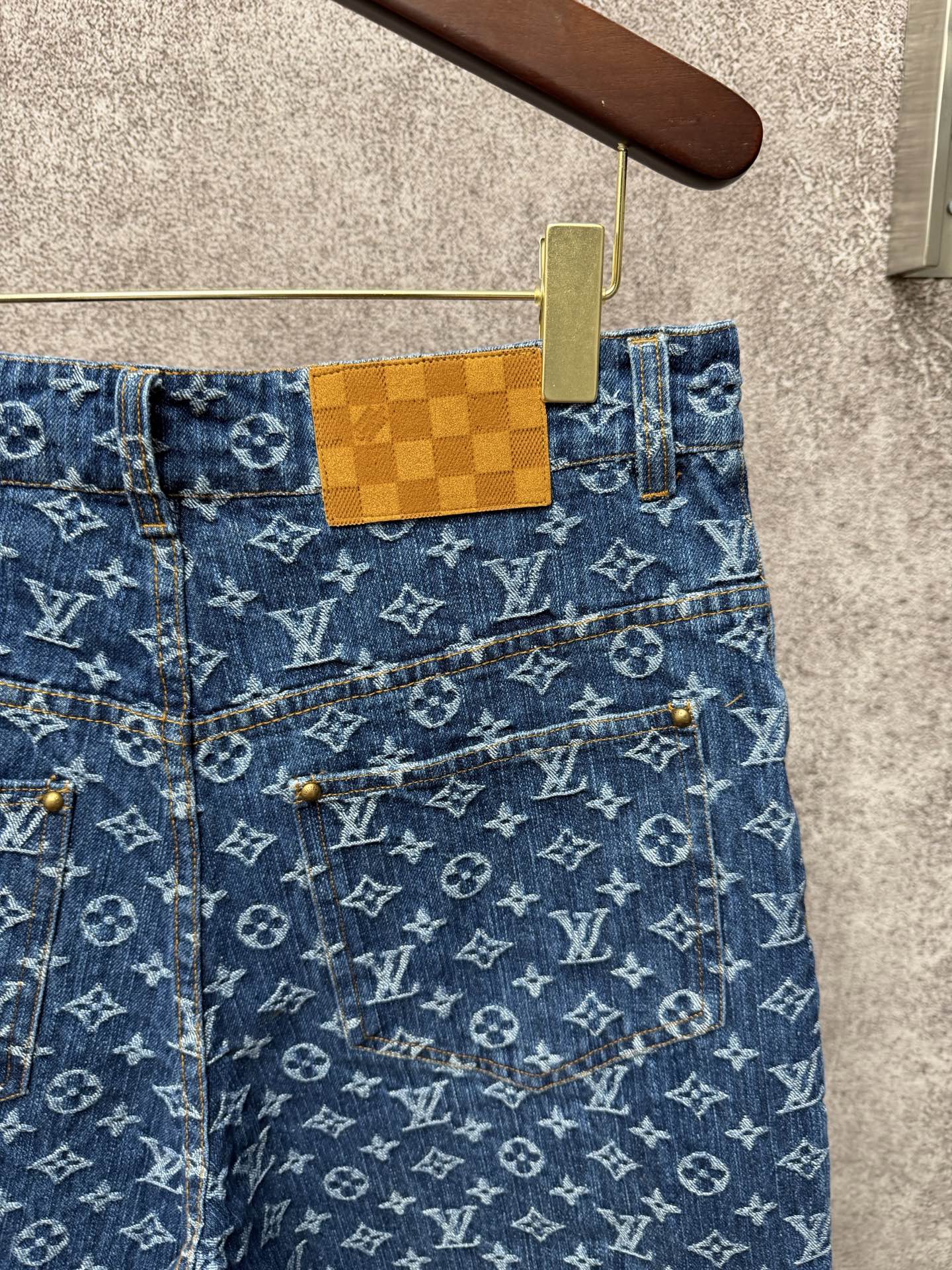 Louis Vuitton monogram denim shorts with waistband patch and belt loops