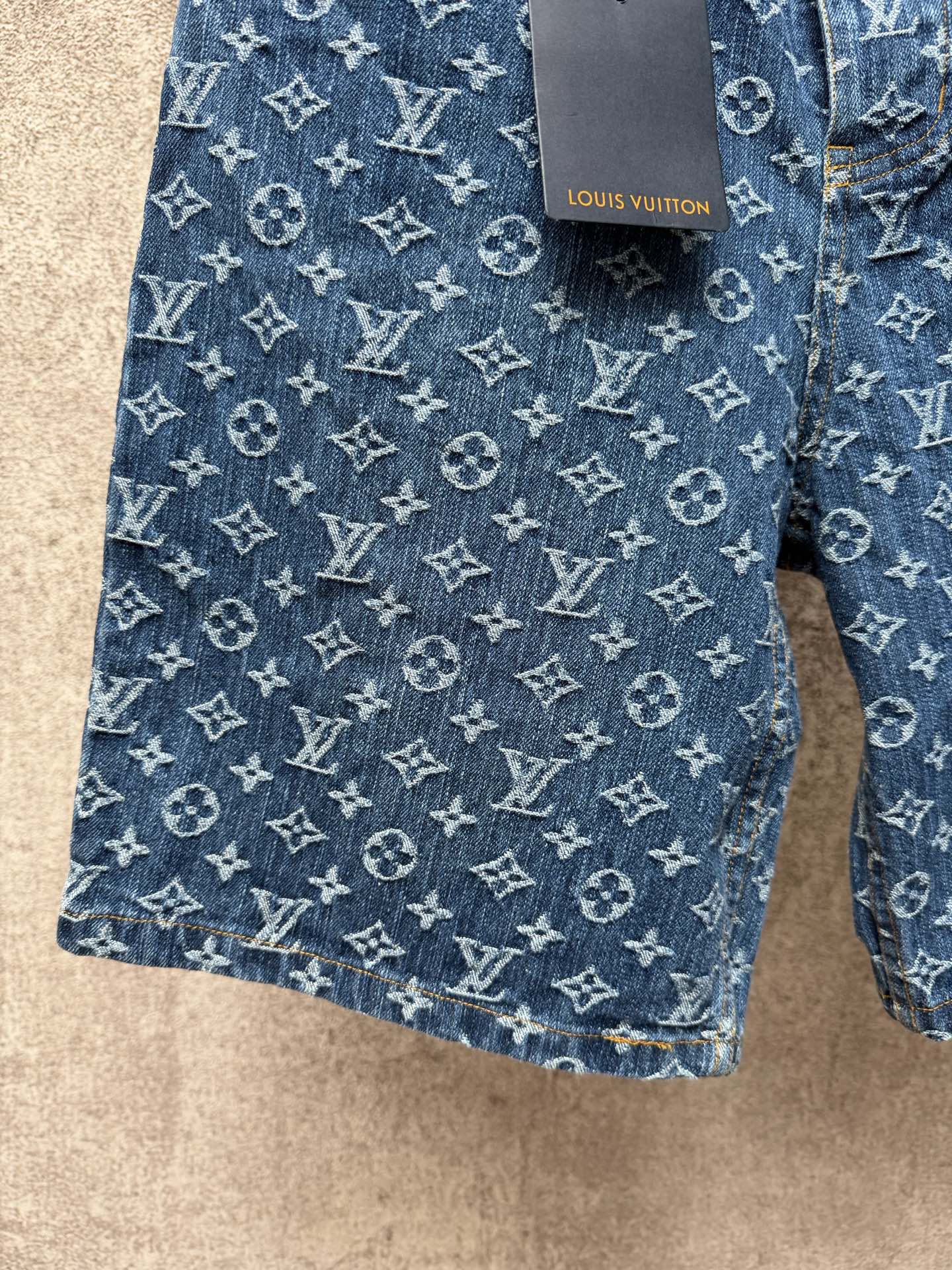 Louis Vuitton monogram denim pocket panel with printed tag