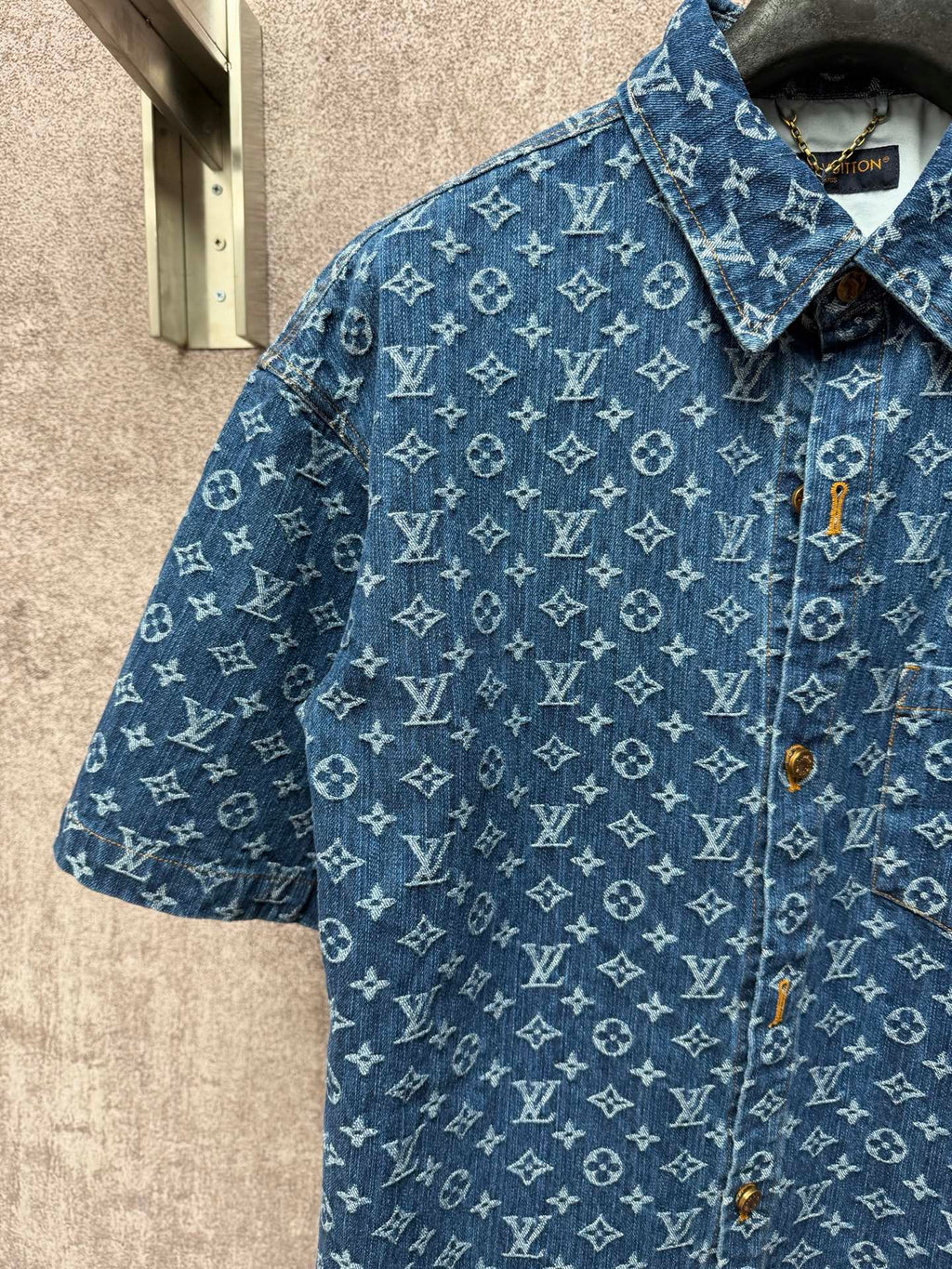 Blue monogram short-sleeve shirt with pointed collar and gold-tone button details
