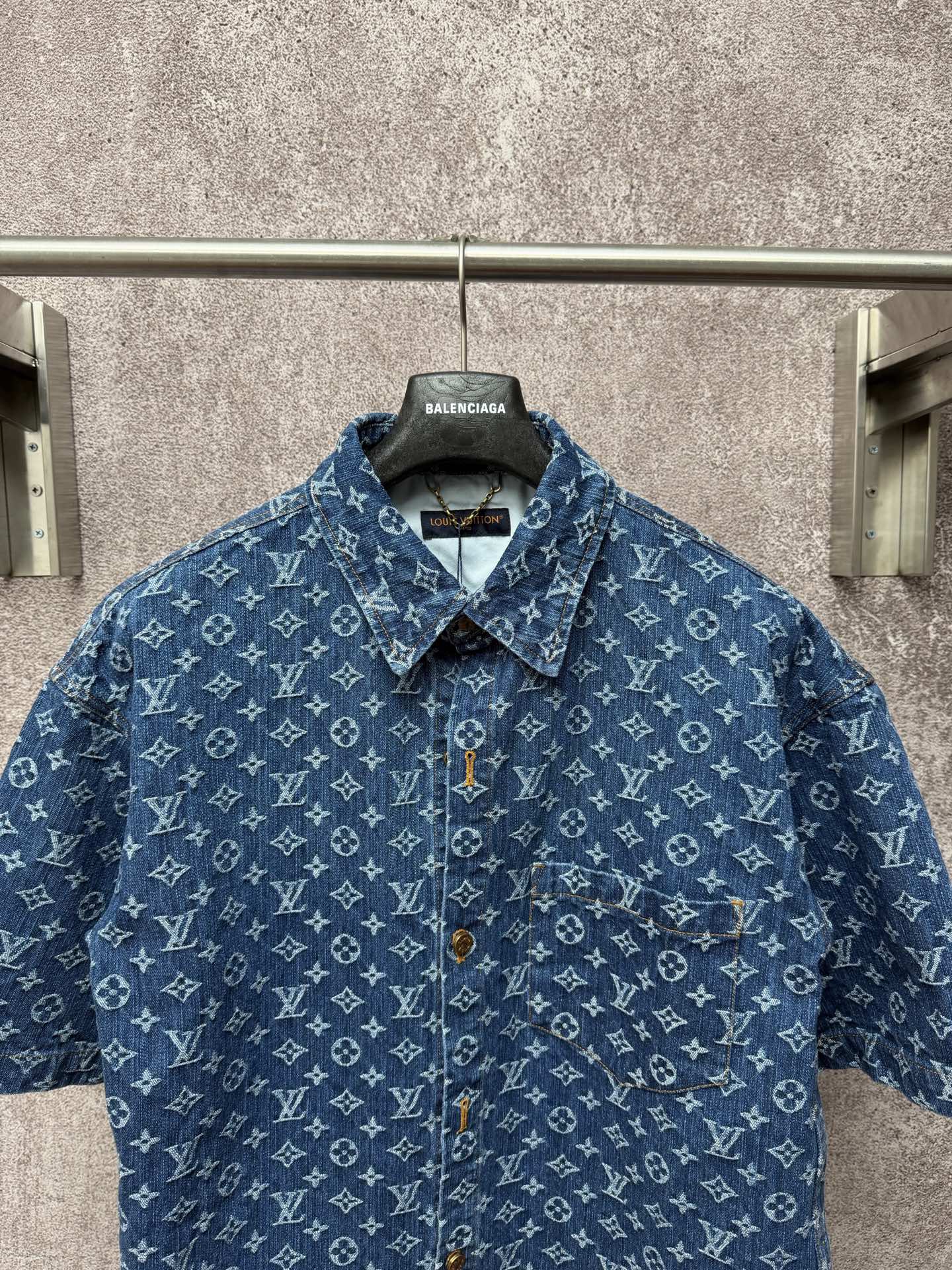 Blue patterned short-sleeve shirt with spread collar and front buttons; BALENCIAGA tag