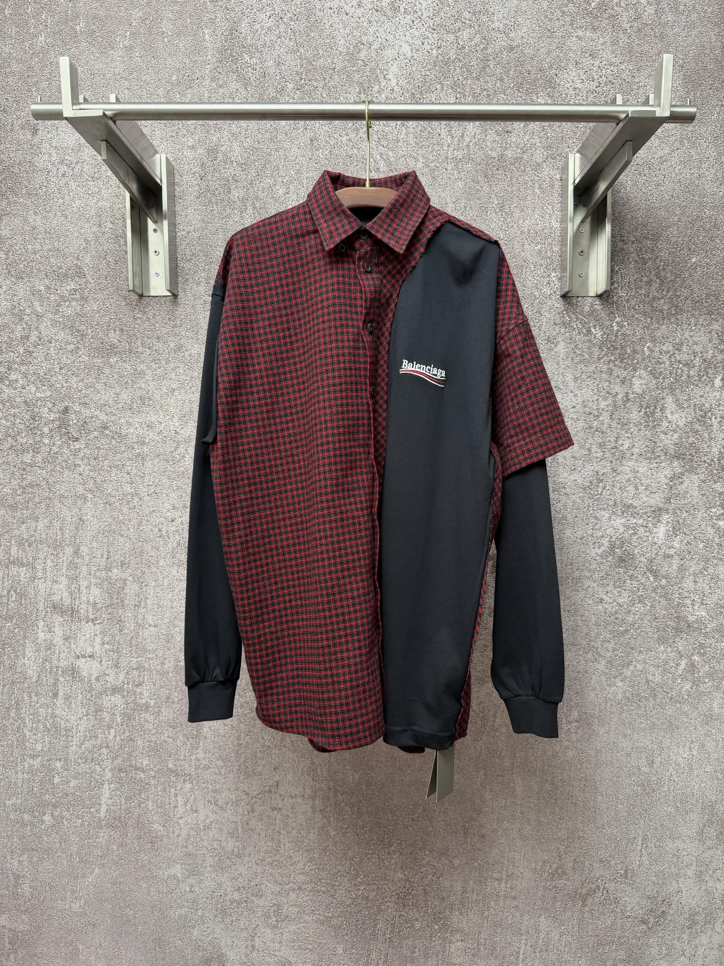 Long shirt with red-and-black check yoke and dark gray button front, long sleeves