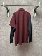 Long shirt back view with red-and-black check fabric and dark gray side panels