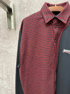 Long shirt with red-and-black check fabric and dark gray panel, buttoned collar