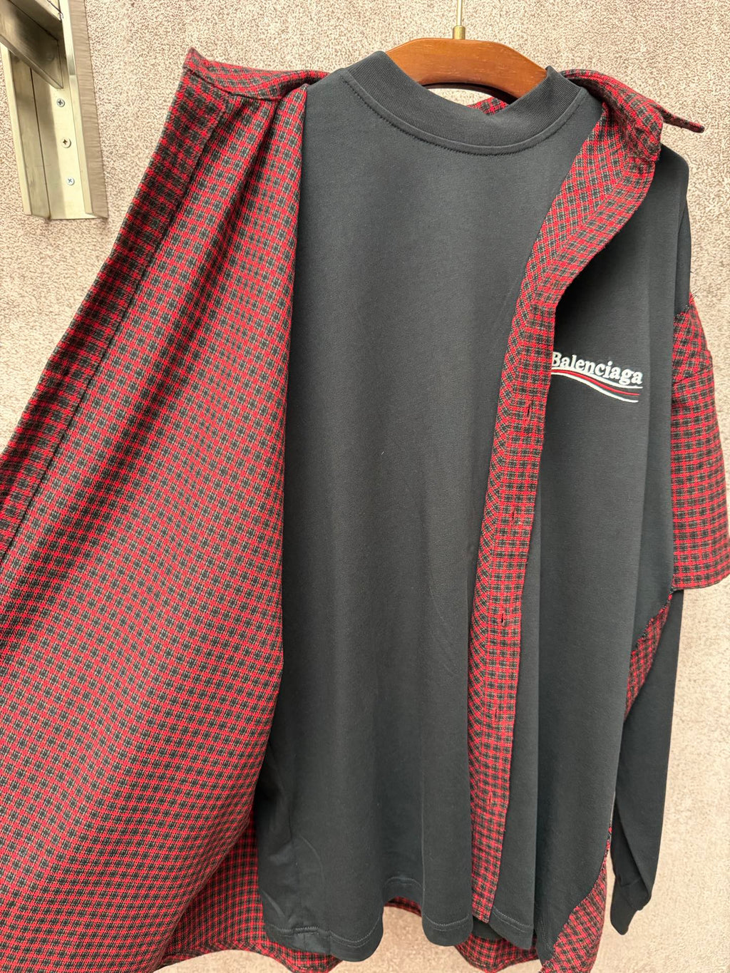 Long dark gray crewneck T-shirt with red plaid outer layer, Balenciaga chest logo