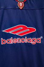 Balenciaga blue short-sleeve shirt with oversized Balenciaga logo and red swoosh
