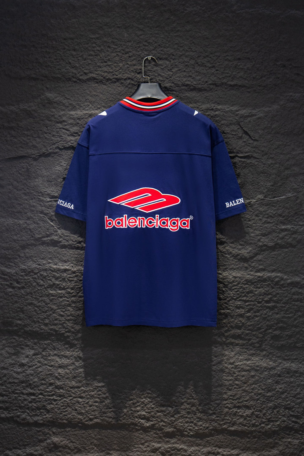 Balenciaga blue short-sleeve shirt with large back logo and striped collar