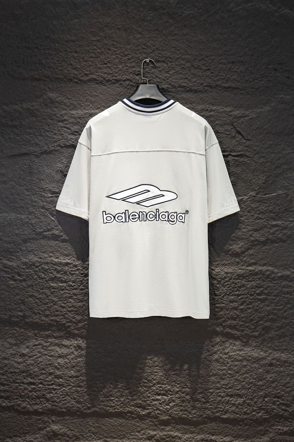 Balenciaga white T-shirt back view with blue-trim collar and logo print