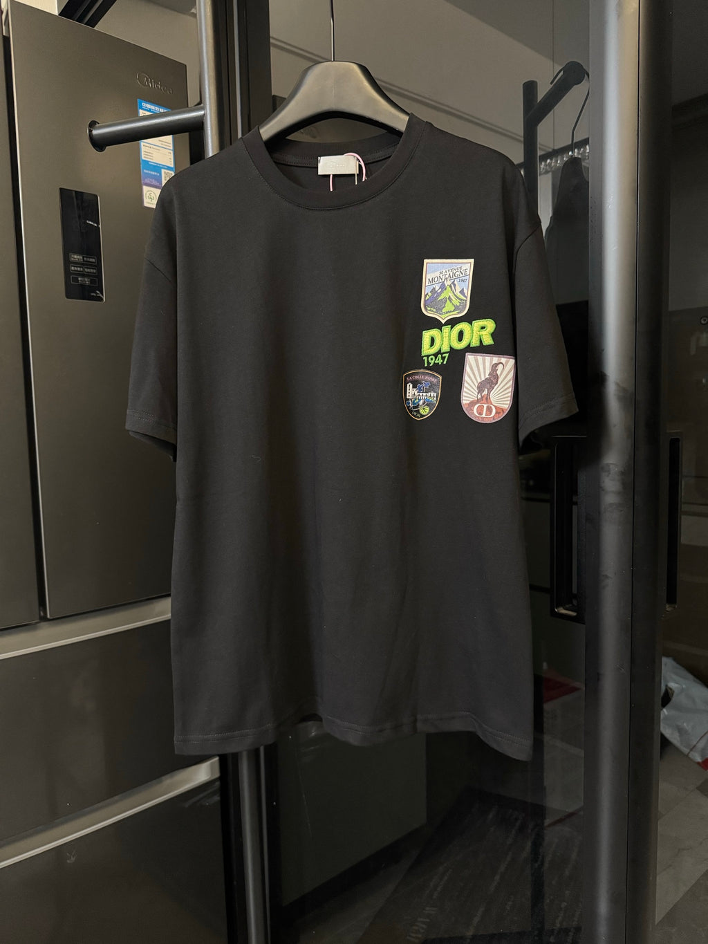Black crew-neck T-shirt with front Dior patch graphics