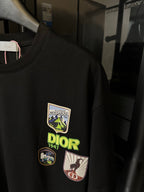 Black T-shirt with embroidered Dior crest graphic patch