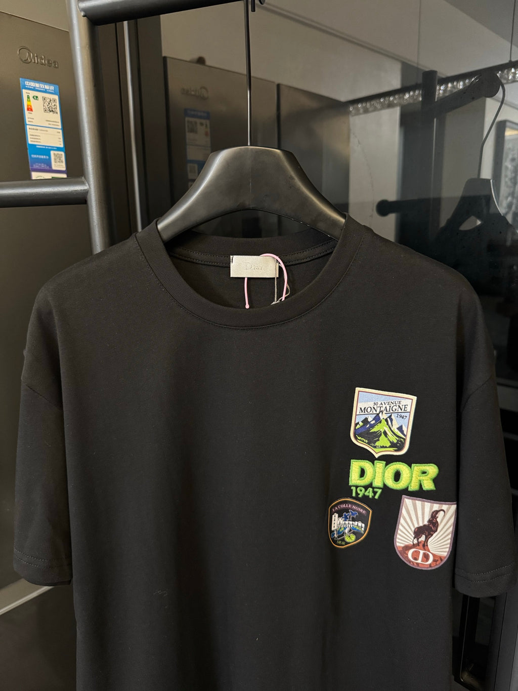 Black crew-neck T-shirt with Dior chest patch graphics