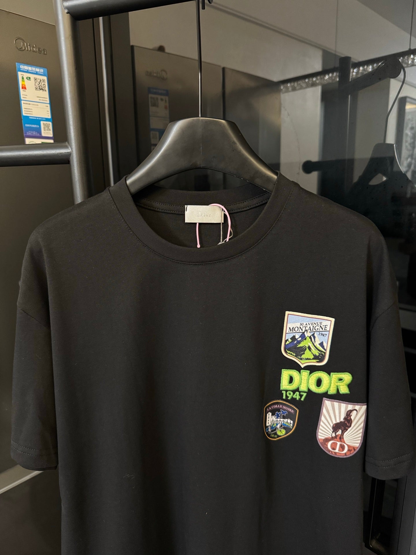 Black crew-neck T-shirt with Dior chest patch graphics