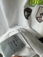 White Dior short-sleeve T-shirt fabric and inner tag near hem