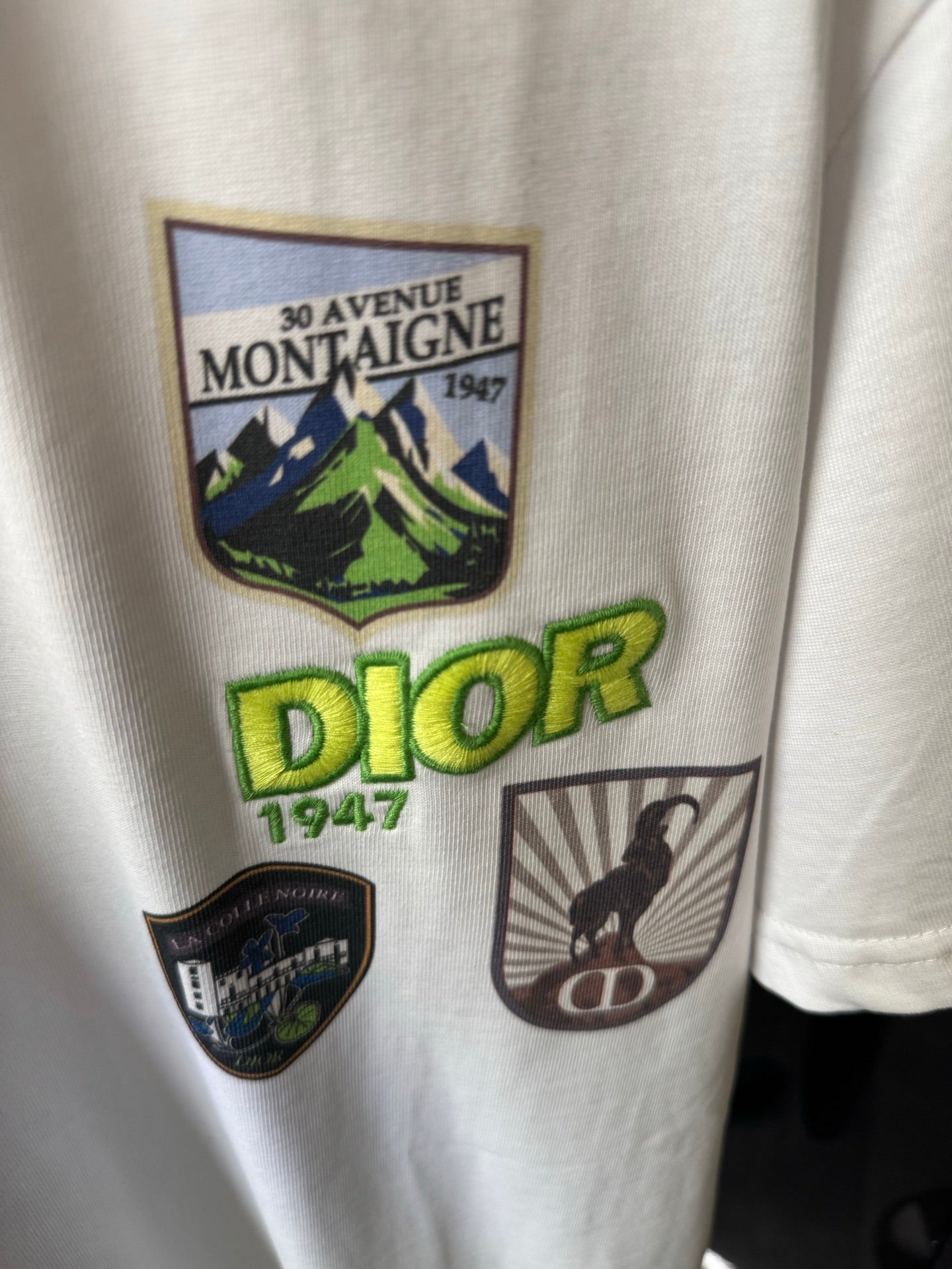 White Dior short-sleeve T-shirt with large Dior 1947 and four patch graphics