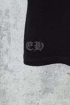 Black shorts hem with small embroidered logo near cuff