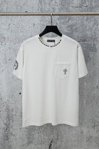 White crew-neck T-shirt with left chest pocket and cross-style graphic print