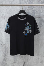 Black crew-neck T-shirt with blue cross graphic and small emblem on sleeves
