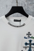 White crew-neck T-shirt with round collar logo and blue cross chest graphic