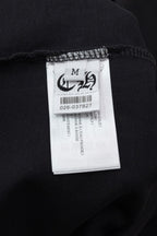 Black T-shirt fabric with woven size label inside neck