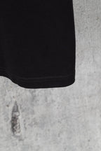 Black short-sleeve T-shirt sleeve hem detail with ribbed cuff